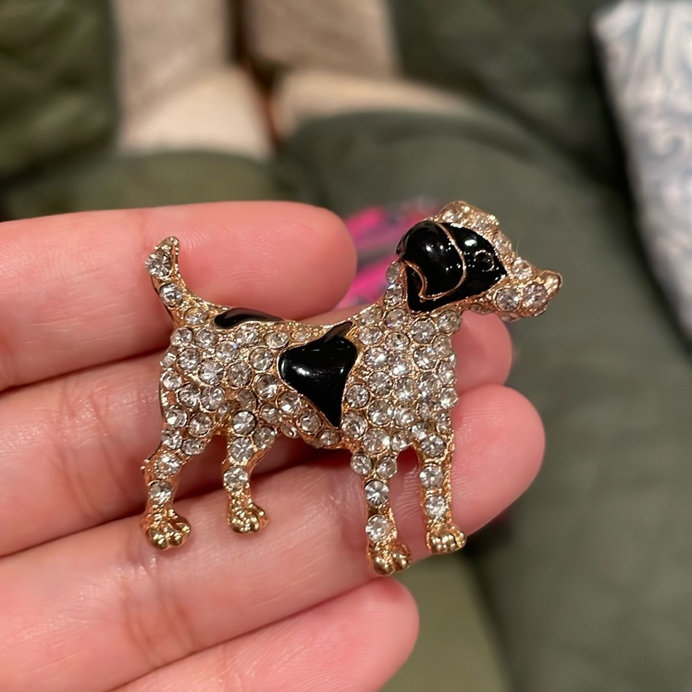A Rhinestoned Black and white dog Pin